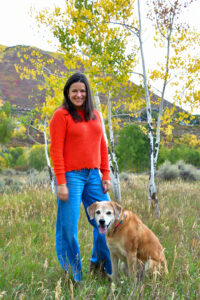Image of Melissa and her golden retriever Denali